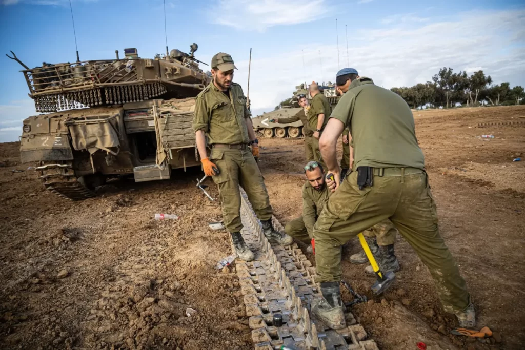 Israeli soldiers doing repairs near the border with the Gaza Strip on Tuesday