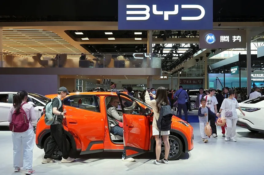 Visitors view BYD's affordable electric car, the 'Seagull,' at the auto show held in Beijing last week. This model has generated significant interest in the global market. Photo: Reuters
