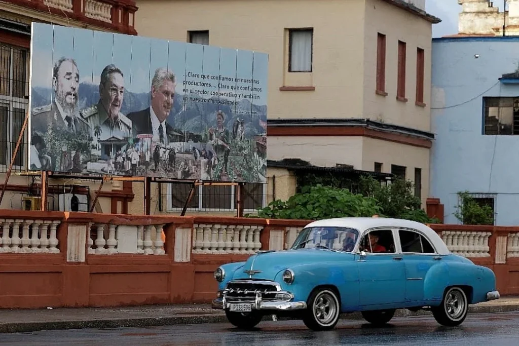 Portraits of Cuban Revolution leader Fidel Castro, former President Raúl Castro, and current President Miguel Díaz-Canel adorn the streetsides of Havana, the capital of Cuba. File photo: Reuters.