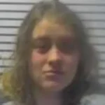 Woman detained by police for driving naked.