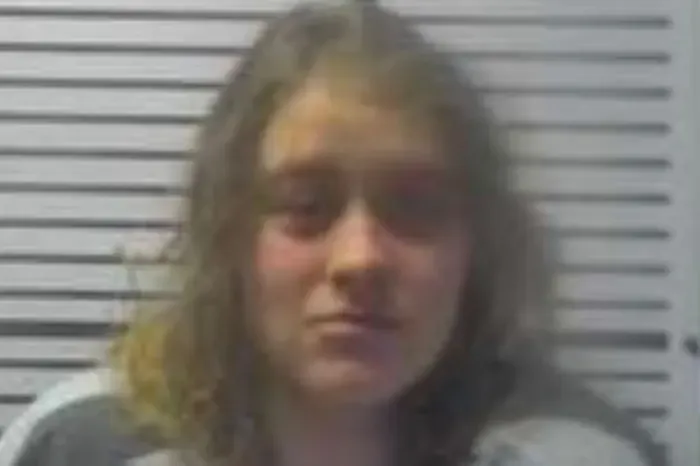 Woman detained by police for driving naked.