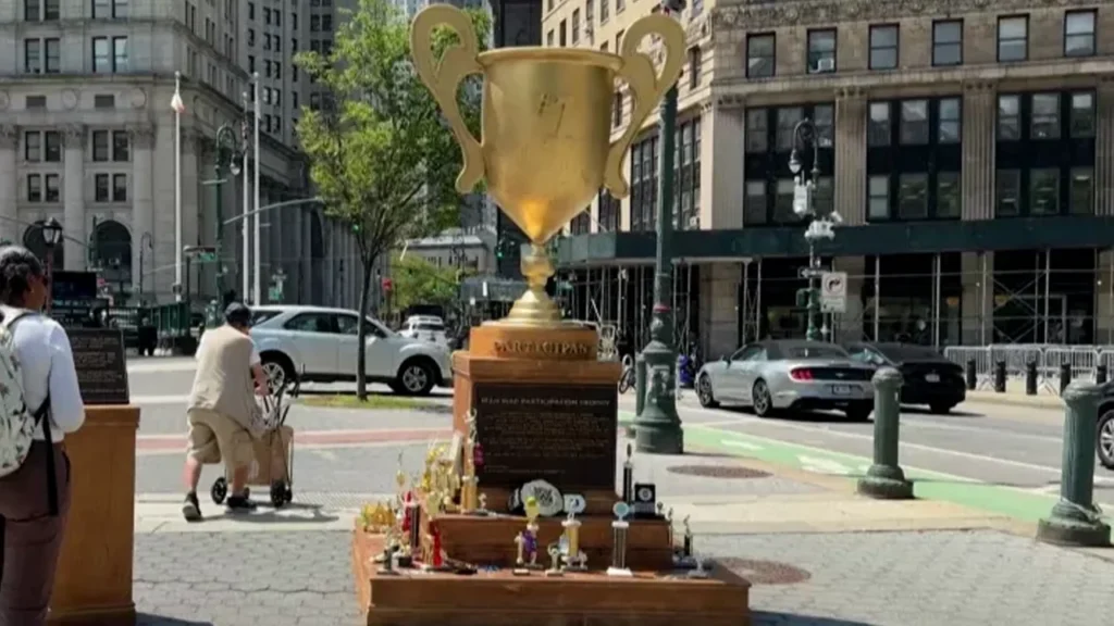 10-foot-tall golden trophy mocking Trump installed in New York