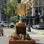 10-foot-tall golden trophy mocking Trump installed in New York