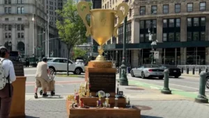 10-foot-tall golden trophy mocking Trump installed in New York