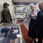 Japan strongly protests Putin s visit to the disputed island.
