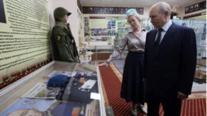 Japan strongly protests Putin s visit to the disputed island.
