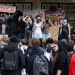Police baton-charge student protests across France